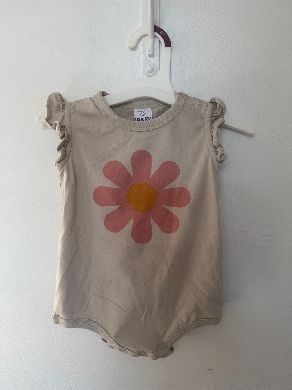 Cotton On Beige Bodysuit with Pink Flower and Yellow Center